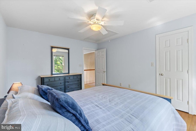1381 Sunwood Ter, Annapolis, MD 21409 - bedroom with attic access, light wood-type flooring, and ceiling fan
