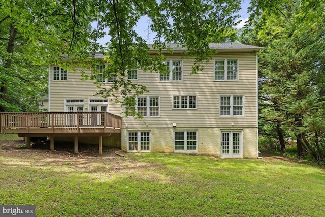 1381 Sunwood Ter, Annapolis, MD 21409 - rear view of house featuring french doors, a lawn, and a deck
