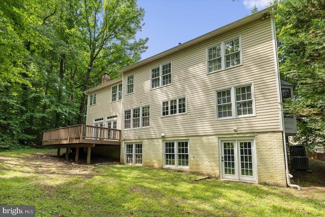 1381 Sunwood Ter, Annapolis, MD 21409 - rear view of property featuring a chimney, a yard, a wooden deck, and brick siding