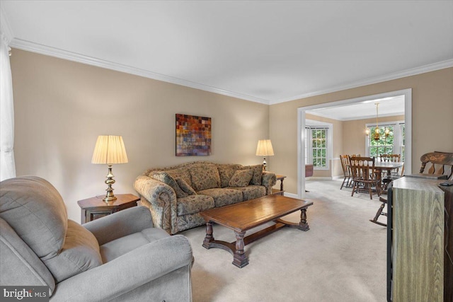 1381 Sunwood Ter, Annapolis, MD 21409 - living room featuring crown molding, light carpet, baseboards, and a chandelier