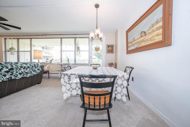 7900 Old York Rd Unit 704-B, Elkins Park, PA 19027 - dining room with a chandelier, carpet floors, and ceiling fan