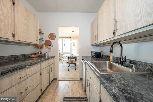 7900 Old York Rd Unit 704-B, Elkins Park, PA 19027 - kitchen with light brown cabinetry, light wood-type flooring, dishwasher, open shelves, and dark stone counters