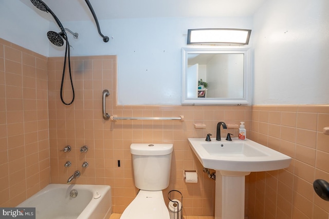 7900 Old York Rd Unit 704-B, Elkins Park, PA 19027 - bathroom with washtub / shower combination, tile walls, and wainscoting