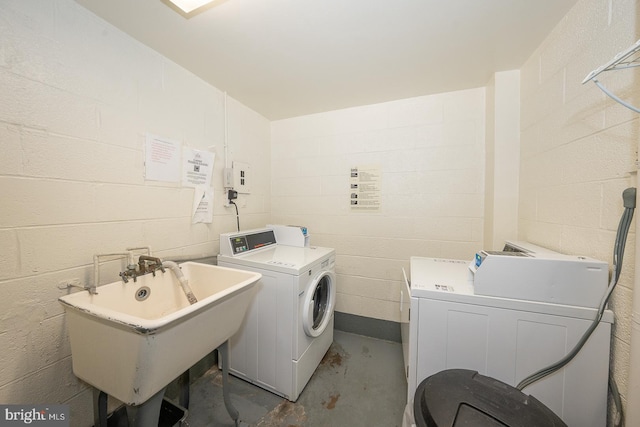 7900 Old York Rd Unit 704-B, Elkins Park, PA 19027 - community laundry room with washing machine and dryer and concrete block wall