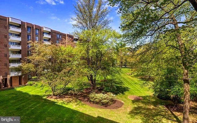 7 Slade Ave Unit 401, Baltimore, MD 21208 - view of community featuring a lawn