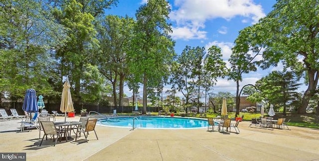 7 Slade Ave Unit 401, Baltimore, MD 21208 - community pool featuring a patio