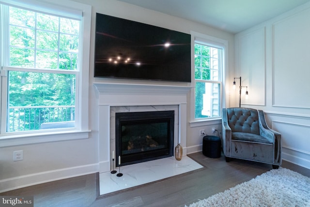 233 W Ponds Edge Dr, Media, PA 19063 - living room featuring a premium fireplace, baseboards, and wood finished floors