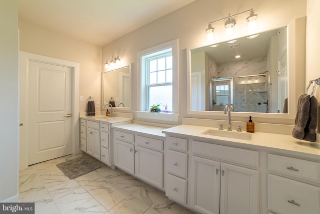 233 W Ponds Edge Dr, Media, PA 19063 - full bathroom with marble finish floors, double vanity, and a marble finish shower