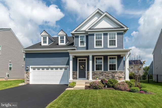2038 Morgan Creek Dr, Quakertown, PA 18951 - view of front of home featuring driveway, stone siding, a porch, a garage, and roof with shingles