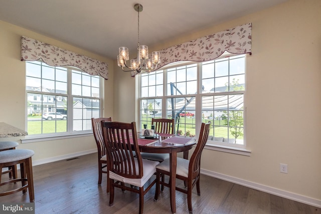 2038 Morgan Creek Dr, Quakertown, PA 18951 - dining area with a chandelier, baseboards, and wood finished floors