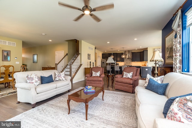 2038 Morgan Creek Dr, Quakertown, PA 18951 - living room featuring light wood-type flooring, stairs, a ceiling fan, and recessed lighting
