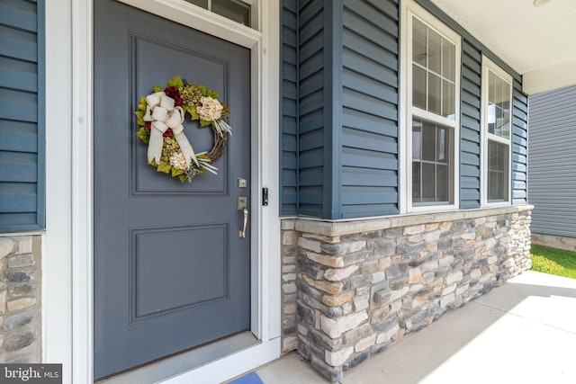 2038 Morgan Creek Dr, Quakertown, PA 18951 - view of exterior entry featuring stone siding and a porch