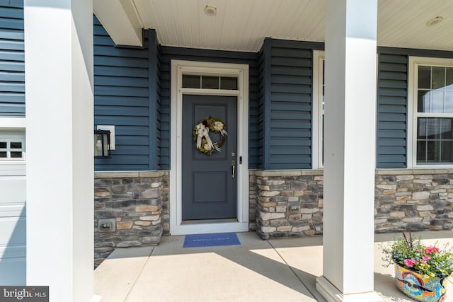 2038 Morgan Creek Dr, Quakertown, PA 18951 - view of exterior entry with stone siding and a porch