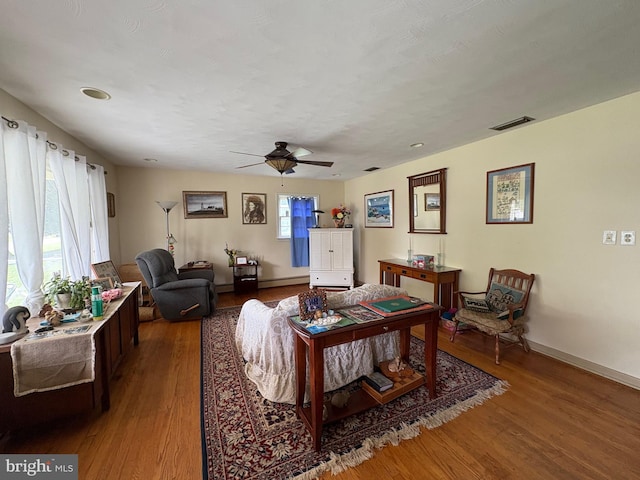 425 Beechcroft Rd, Winchester, VA 22601 - living room with wood finished floors, ceiling fan, baseboards, and a baseboard heating unit