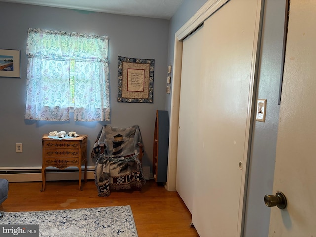425 Beechcroft Rd, Winchester, VA 22601 - sitting room with wood finished floors and a baseboard radiator