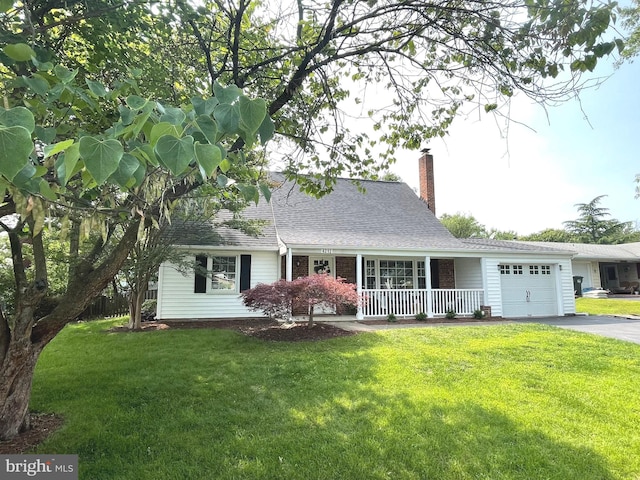 4212 Penner Ln, Fairfax, VA 22033 - cape cod house featuring a porch, a garage, driveway, and a front lawn