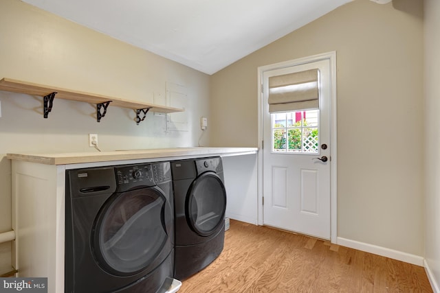 4212 Penner Ln, Fairfax, VA 22033 - laundry room with separate washer and dryer, light wood-type flooring, and baseboards