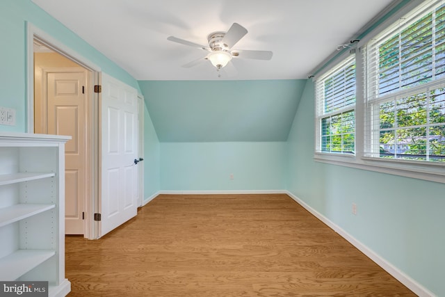 4212 Penner Ln, Fairfax, VA 22033 - additional living space with wood finished floors, ceiling fan, baseboards, and lofted ceiling