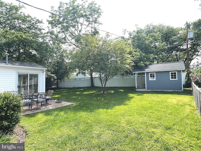 4212 Penner Ln, Fairfax, VA 22033 - view of yard with an outbuilding and a patio area