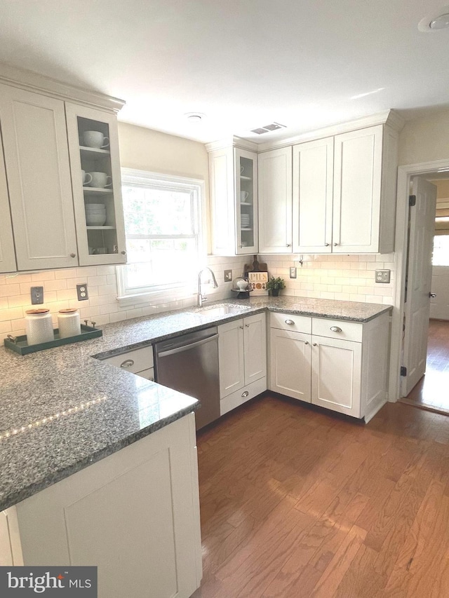 4212 Penner Ln, Fairfax, VA 22033 - kitchen featuring dishwasher, a sink, dark wood-style flooring, and decorative backsplash