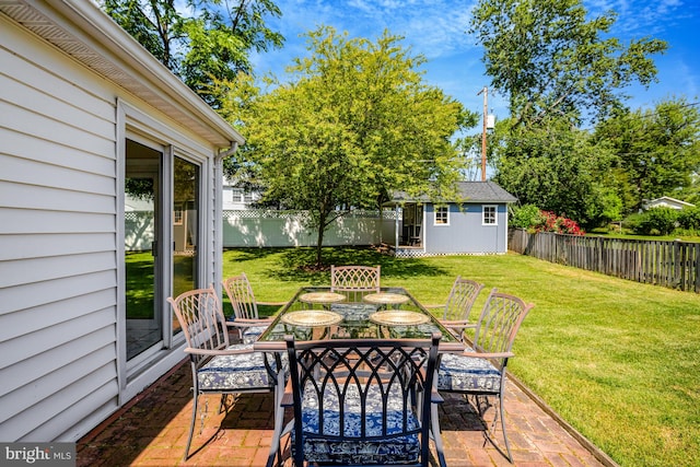 4212 Penner Ln, Fairfax, VA 22033 - view of patio featuring outdoor dining space and an outdoor structure