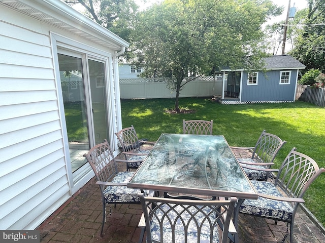 4212 Penner Ln, Fairfax, VA 22033 - view of patio / terrace with outdoor dining area and an outbuilding