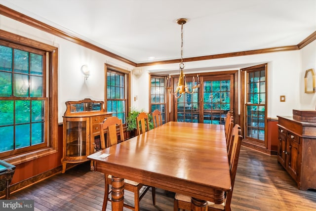 2317 Nancarles Dr, Gambrills, MD 21054 - dining room with crown molding, a chandelier, dark wood-style floors, and wainscoting