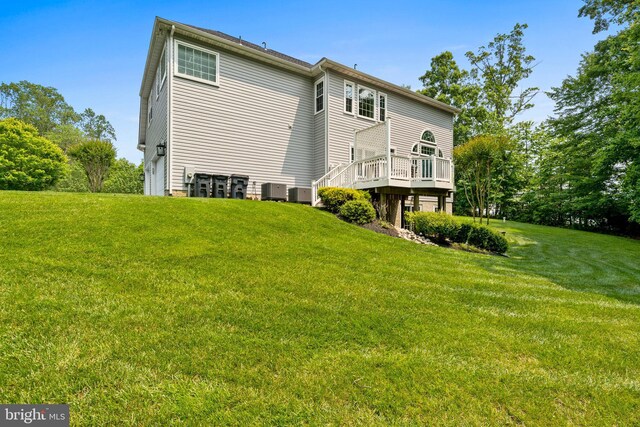 6000 Clairemont Dr, Owings, MD 20736 - back of house featuring a lawn, a deck, and cooling unit