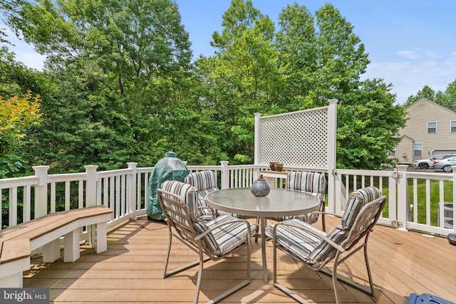 6000 Clairemont Dr, Owings, MD 20736 - wooden terrace with outdoor dining space