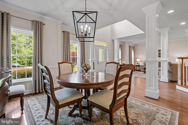 6000 Clairemont Dr, Owings, MD 20736 - dining area with decorative columns, plenty of natural light, ornamental molding, and recessed lighting