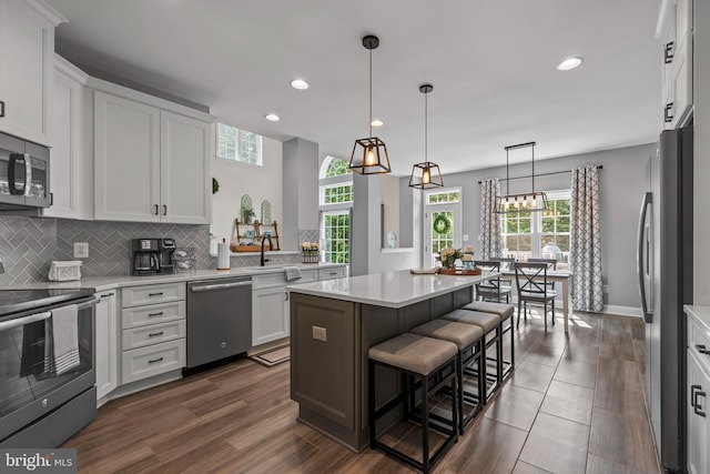 6000 Clairemont Dr, Owings, MD 20736 - kitchen with appliances with stainless steel finishes, recessed lighting, light countertops, and tasteful backsplash