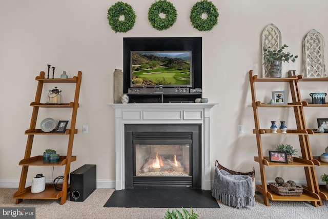 6000 Clairemont Dr, Owings, MD 20736 - detailed view of a fireplace with flush hearth and baseboards