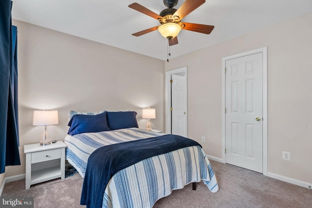 6000 Clairemont Dr, Owings, MD 20736 - carpeted bedroom with baseboards and ceiling fan