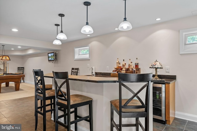 6000 Clairemont Dr, Owings, MD 20736 - indoor wet bar with beverage cooler, baseboards, recessed lighting, billiards table, and pendant lighting