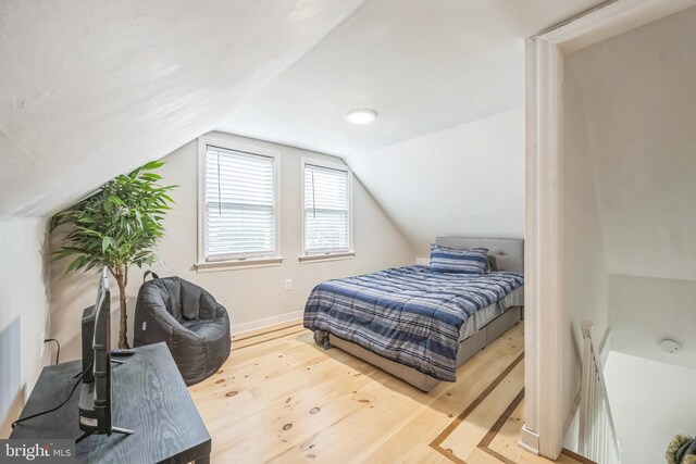 330 Date St, Warminster, PA 18974 - bedroom with wood finished floors and lofted ceiling