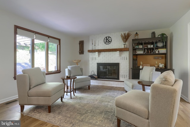 46 Gelsinger Rd, Reading, PA 19608 - living area featuring wood finished floors, a fireplace, and baseboards