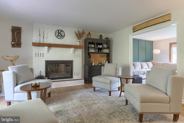 46 Gelsinger Rd, Reading, PA 19608 - living room featuring wood finished floors and a brick fireplace