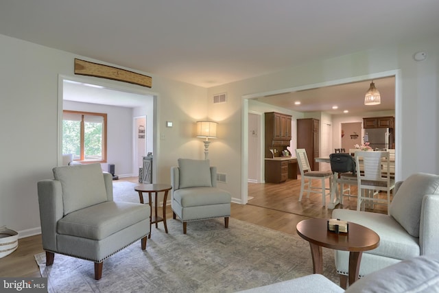 46 Gelsinger Rd, Reading, PA 19608 - living room with light wood finished floors, baseboards, and recessed lighting