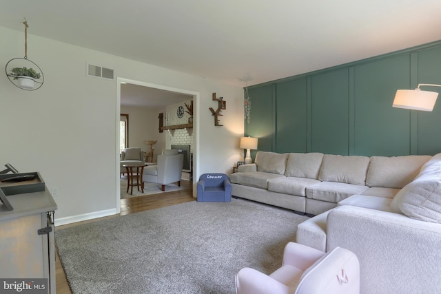 46 Gelsinger Rd, Reading, PA 19608 - living area with a fireplace and wood finished floors