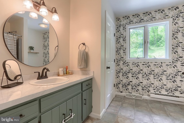 46 Gelsinger Rd, Reading, PA 19608 - bathroom with vanity, a baseboard radiator, baseboards, a shower with curtain, and wallpapered walls
