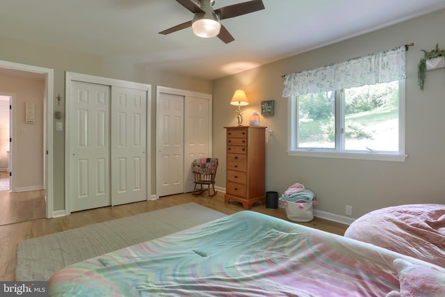 46 Gelsinger Rd, Reading, PA 19608 - bedroom with multiple closets, wood finished floors, and baseboards