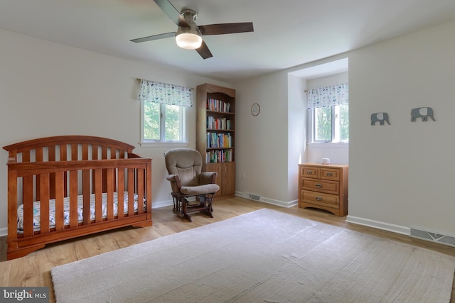 46 Gelsinger Rd, Reading, PA 19608 - bedroom with wood finished floors, multiple windows, baseboards, and ceiling fan