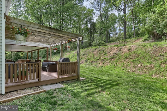 46 Gelsinger Rd, Reading, PA 19608 - view of green lawn featuring a pergola, a wooden deck, and an outdoor hangout area