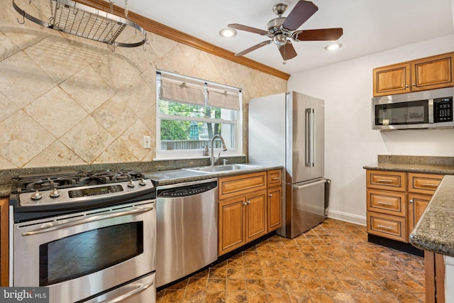 5721 Greenspring Ave, Baltimore, MD 21209 - kitchen with appliances with stainless steel finishes, a sink, brown cabinetry, ceiling fan, and baseboards