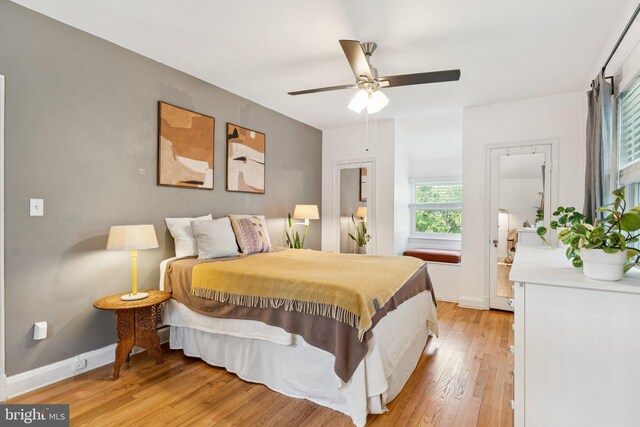 5721 Greenspring Ave, Baltimore, MD 21209 - bedroom with light wood-style flooring, baseboards, and ceiling fan