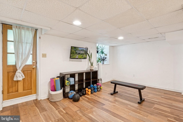 5721 Greenspring Ave, Baltimore, MD 21209 - exercise area featuring wood finished floors, baseboards, and a paneled ceiling