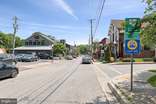 5721 Greenspring Ave, Baltimore, MD 21209 - view of asphalt street featuring sidewalks and curbs