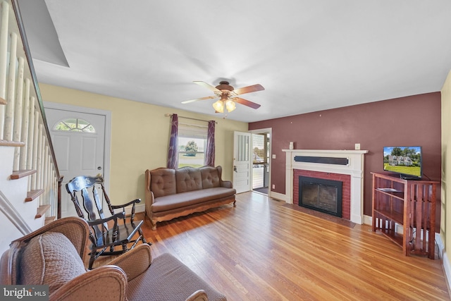 301 Hamilton Blvd, Warsaw, VA 22572 - living area with healthy amount of natural light, light wood-type flooring, baseboards, and a ceiling fan