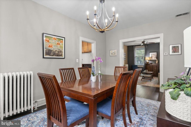 233 Rhode Island Ave NW, Washington, DC 20001 - dining space featuring radiator heating unit, a chandelier, dark wood finished floors, and ceiling fan