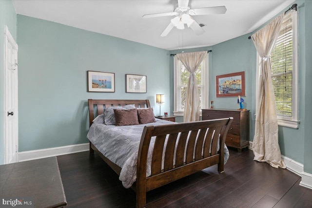 233 Rhode Island Ave NW, Washington, DC 20001 - bedroom with dark wood-style floors, baseboards, and ceiling fan